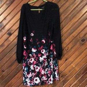 Black dress with floral print. Never worn.